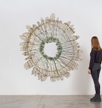 Brie Ruais, <em>Spreading Out and Counting Downward, 130 lbs</em>, 2021. Glazed stoneware, hardware. 89 x 83 x 1.5 inches. Image courtesy of albertz benda gallery, NYC
