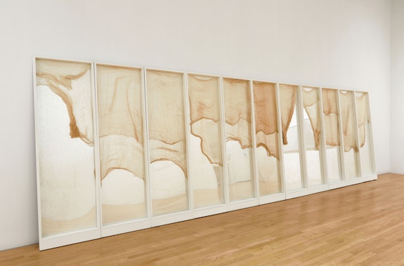 Helène Aylon, <em>Mirror Covering</em>, 1987. Wood, paint, mirrored Plexiglas, gauze  76 1/2 x 255 3/4 x 12 inches. Estate of Helène Aylon; Kerry Schuss Gallery and Leslie Tonkonow Artworks + Projects.