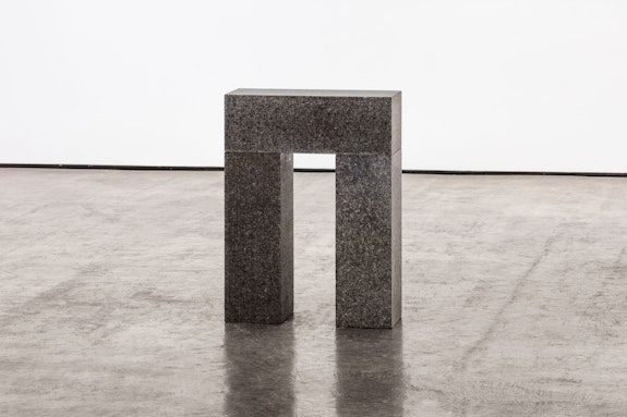 Carl Andre, <em>Manet Post and Lintel</em>, Boston 1980. Quincy granite, 3 units; 1 horizontal on 2 vertical, on floor, each unit 6 x 18 x 6 inches, overall 24 x 18 x 6 inches. © 2022 Carl Andre / Artists Rights Society (ARS), New York. Courtesy Paula Cooper Gallery, New York; Photo: Steven Probert.