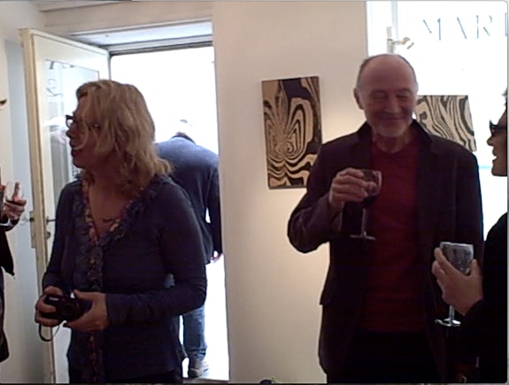 Brigitte Engler and Sylvère Lotringer before his reading performance in Engler’s show in Paris. Still from a video by Elie de Labrusse Guattari.