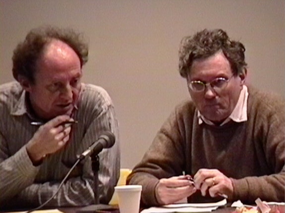 1991 CalArts lecture. Still from video by Josephine Meckseper. 