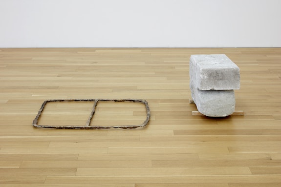 Esther Kläs, <em>BEGINNINGS</em>, 2021. Concrete, bronze, pigment and wood, 27 x 68 x 18 inches. Courtesy the artist and Peter Blum Gallery.