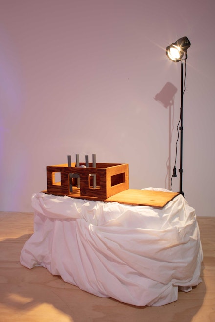 Sahra Motalebi, <em>Another Diagram for Another Empty Stage (Diorama)</em>, 2022. Linen, wood, speaker, spray paint, led bulb, light and stand, dimensions variable. Courtesy the artist and Brief Histories, New York.