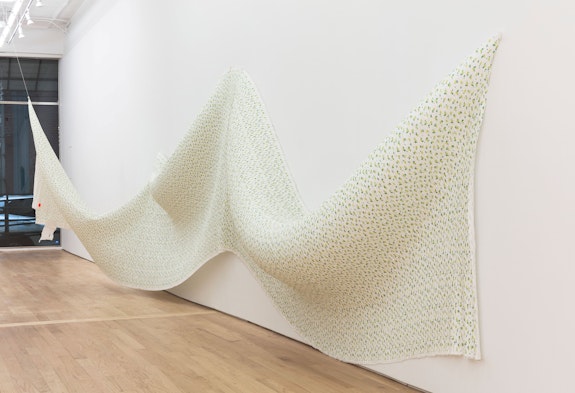 Eric N. Mack, <em>Bodice</em>, 2022. Pleated polyester, paper, string, and pins, 80 x 280 x 60 inches. Courtesy Nicelle Beauchene, New York.