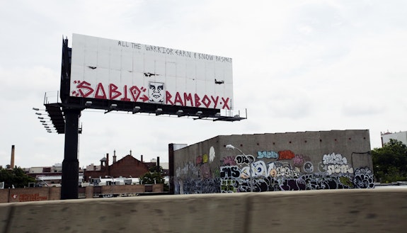 SABIO and RAMBO billboard over the BQE. Photo: Jake Dobkin/Gothamist.