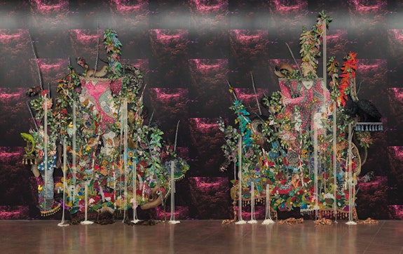 Ebony G. Patterson,<em> ....in the swallowing...she carries the whole...the hole</em>, 2021–22. Hand-cut jacquard woven photo tapestry with appliqué, fabric, plastic, beads, feathers, trim, glitter, and wood mounted on wallpaper in two parts, 50 3/8 x 86 1/4 x 5 7/8 inches. Courtesy the artist; Hales, London and New York; and Monique Meloche Gallery, Chicago. Photo: JSP Art Photography.