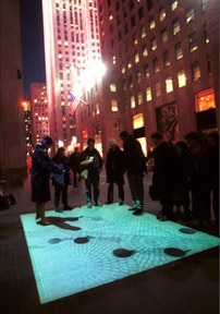 Pedestrian projected onto the Rockefeller Center plaza. Photo courtesy of the artists.