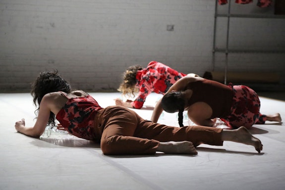 Azrielli, Abril, and Levine crawl across the stage on elbows and knees. Photo: Brian Rogers.