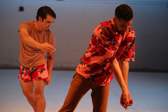 Pourzal (foreground) and Barnett (background) perform soft, twisting gestures. Photo: Brian Rogers.