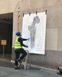 Christian Hincapié at work at Rockefeller Center on <em>Art Decoy (from Industry and Agriculture, One Rockefeller Plaza by artist C. Paul Jennewein)</em>, 2018. Courtesy the artist.