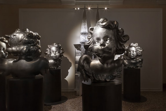 Installation view, <em>Rachel Lee Hovnanian: Silenced White Angels</em>, Venice Biennial: Biblioteca Zenobiana del Temanza, 2022. White bronze on steel base, consisting of a series of seven sculptures, each measuring 198 x 78 x 68 cm on pedestal. Courtesy the artist and Leila Heller Gallery. Photo: Angela Colonna.