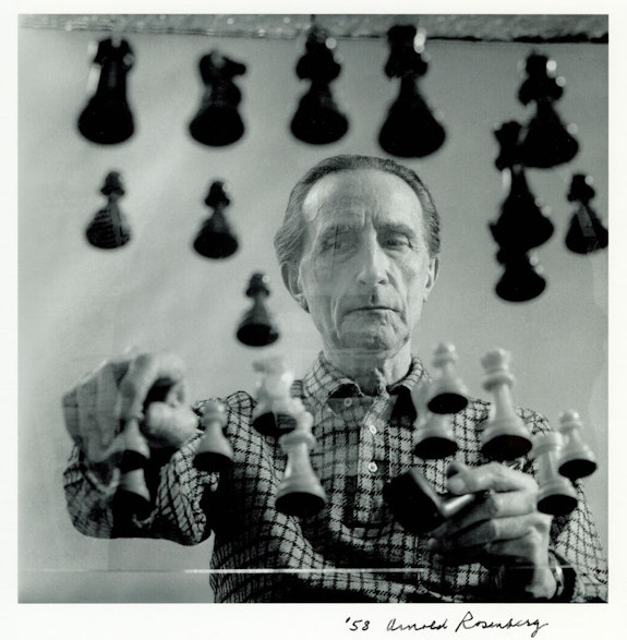 Arnold Rosenberg, Marcel Duchamp Playing Chess on a Sheet of Glass, 1958, gelatin silver print, 7 ½ x 7 ½ inches. Private Collection, New York.