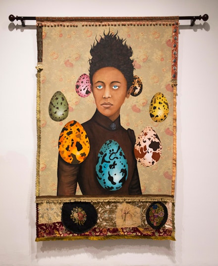 Lezley Saar, <em>Septime, a collector of breezes, hoarder of voices, and gatherer of olfactory ephemera, once hanged her lover into a lake to protect him.</em>, 2019. Acrylic on fabric, embellishments, curtain rod, 89 x 76 inches. Collection of Diane Allen.