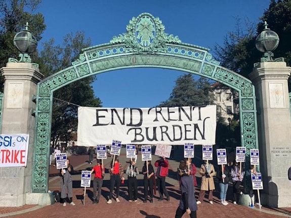 Strikers form a picket across the iconic Sather Gate at UC Berkeley. Photo: Zach Hicks.