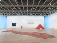 Installation view of <em>In the Balance: Painting and Sculpture, 1965-1985 </em>(Whitney Museum of American Art, New York, October 19, 2022 – March 5, 2023). From left to right: Lynda Benglis, <em>Contraband</em>, 1969; Dorothea Rockburne, <em>Balance, 1985; </em>Mary Ann Unger, <em>Water Spout</em>, 1980-81; Jane Kaufman, <em>Untitled</em>, 1969; Judy Chicago, <em>Trinity (Outdoor Version)</em>, 1965/2019. Photograph by Ron Amstutz