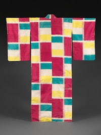<em>Meisen Kimono with Large Checkered Pattern, </em>Showa period, 1930s. Plain-weave machine-spun silk in resist-dyed large ikat (ōgasuri) with gold-thread weft, 59 × 49 inches. Promised Gift of John C. Weber. Courtesy The Metropolitan Museum of Art.
