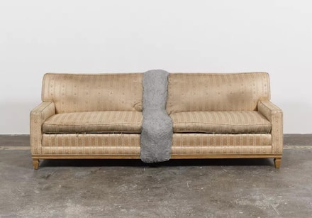 Rodney McMillian, <em>Couch</em>, 2012. Couch and cement. Courtesy the artist and Maccarone, New York/Los Angeles.