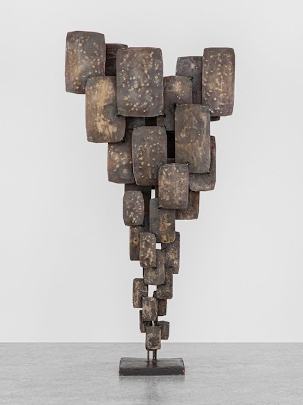 Harold Cousins, <em>Untitled (Gothique Plaiton)</em>, 1970. Steel on steel and painted wood base, 42 3/8 x 21 1/4 x 6 1/2 inches. © Estate of Harold Cousins. Courtesy Michael Rosenfeld Gallery LLC, New York, NY.