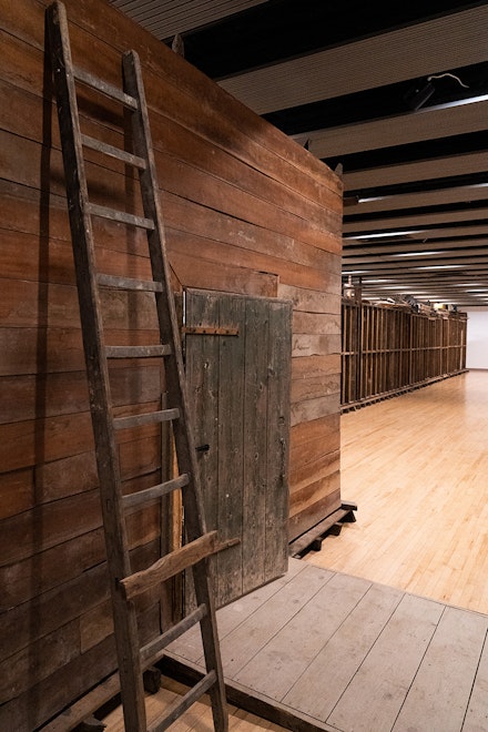 Installation view: <em>Mike Nelson, The Deliverance and The Patience</em>, exterior, 2001. Various materials. Photo: Liam Harrison. Courtesy the artist and the Hayward Gallery.