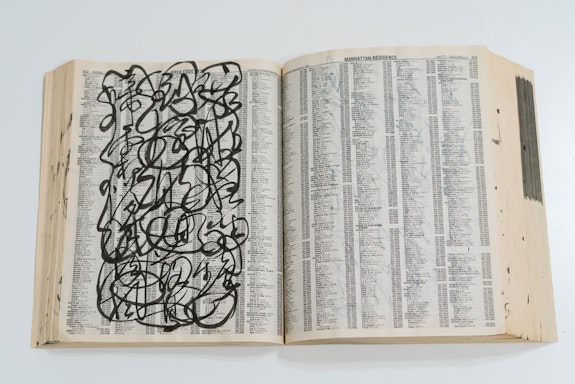 C. C. Wang, <em>no title (Phonebook with Artist’s Calligraphy Practice)</em>, 1998. Ink on telephone book, 10 ¾ x 19 ½ x 2 inches. Private Collection. © the Estate of C.C. Wang. Photo: Fu Qiumeng Fine Art.