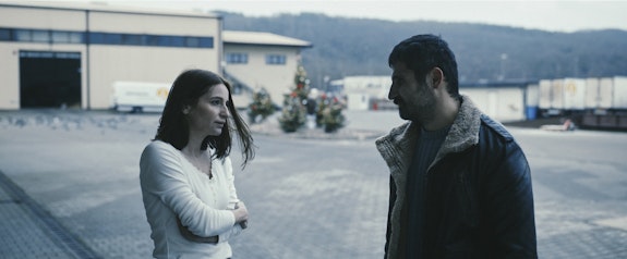 Judith Slate as “Csilla” and Marin Grigore as “Mattias” in Cristian Mungiu’s <em>R.M.N. </em>Courtesy of IFC Films. An IFC Films Release.
