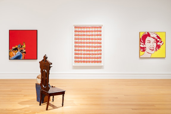 View of a gallery in the Wilmers Building with, from left to right, Rosalyn Drexler,<em> Lovers</em>, 1963; Marisol, <em>Tom Thumb</em>, 1997; Andy Warhol, <em>100 Cans</em>, 1962; Roy Lichtenstein, <em>Head - Red and Yellow</em>, 1962. Courtesy of Buffalo AKG Art Museum, OMA, Studio Other Spaces, and Cooper Robertson. Photo: Marco Cappelle.