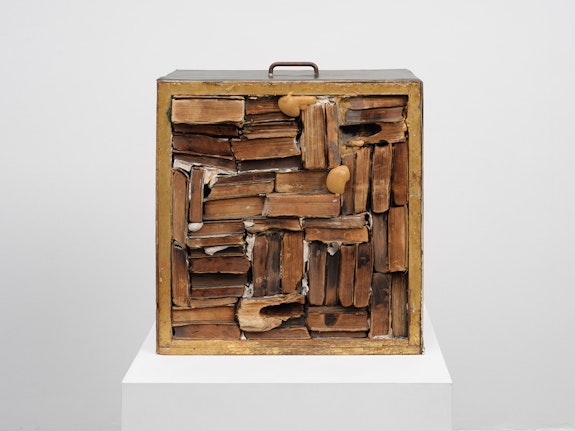 John Latham, <em>Drawer with Charred Material</em>, 1960. Drawer filled with books, plaster and vinyl, 22 3/8 x 20 5/8 x 11 3/8 inches. © John Latham Estate. Courtesy Lisson Gallery.