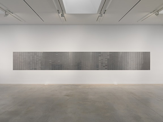 Installation view: <em>Sung Tieu: Infra-Specter</em>, Amant, Brooklyn, 2023. Featuring Sung Tieu, <em>Mural for America</em>, 2023. 1,900 stainless steel plaques, engraved, screws. Courtesy Amant. Photo: New Document. 