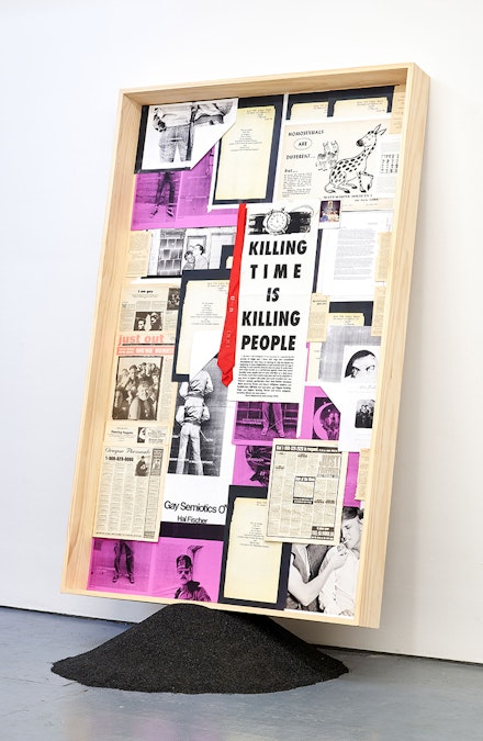 Ryan Patrick Krueger, <em>For My People (Semiotics #1)</em>, 2022. Wood box, photocopies, pigment prints, newspaper clippings, act up poster, red tie, book pages, and sand, 75 x 45 inches. Courtesy Tiger Strikes Asteroid New York. 