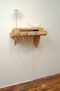 Marie Sivak, “Floating Remnants,” (2007), carved alabaster, marble, selenite, video, string, mdf, pencil, wax, stainless steel, brass.