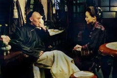 A man, a woman, and a love affair that goes wrong three times in three different eras: Hou pays homage to his own <i>Flowers of Shanghai</i> (1998) in the 1911 episode of <i>Three Times</i> (2005).