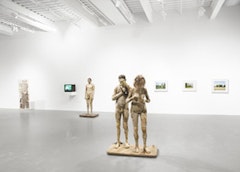 Installation shot with Pawel Althamer's sculptures foreground and at left. Photo by Benoit Pailley.