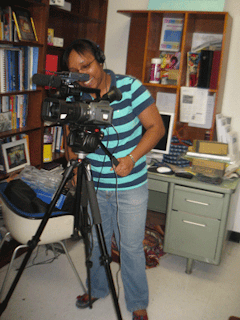 Kemille Jackson, archivist, MA in History and Archival studies, Brooklyn College, sets up an interview.  Photo by Barbara Winslow.