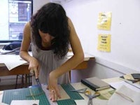 <i>Despite the innovations of on-demand publishing, some artists still like to bind books by hand at The Center for Book Arts.</i>