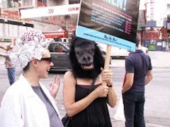 A Brainstormer and Guerrilla Girl preparing to protest Chelsea.