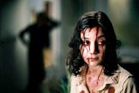 Lina Leandersson as Eli, above,  in <i>Let the Right One In</i> © EFTI.
