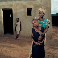 Valentine with her daughters, Amelie and Inez. By Jonathan Torgovnik, from the exhibition and book Intended Consequences: Rwandan Children Born of Rape (Aperture, 2009).