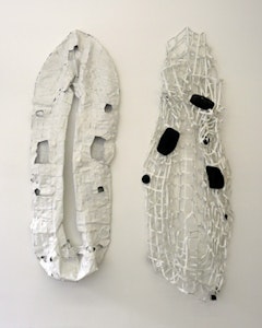Ishmael Randall Weeks, “Primed” (2009). 2 parts, cut and painted rubber boats and staples. Height: 96˝; Installation dimensions variable. Courtesy of Eleven Rivington, New York.

