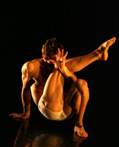 Larry Keigwin in <i>Mattress Suite.</i>  Photo by Steven Schreiber.