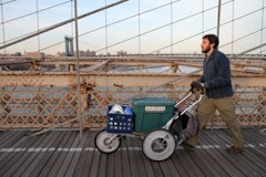Crossing the Brooklyn Bridge.