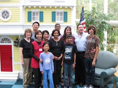 The Flushing Rotary Club (the Host Club ) hosted a get together for Vasu Chadeesingh and his family in the Ronald McDonald House in New Hyde Park where Vasu stayed since his arrival on 9/8. Front row, left to right: Pat Coulaz, G.O.L. Program Director, Veronica
Tsang, G.O.L. Sponsor and Flushing Rotary Club Vice President, Annie Cheng, Shobha Chadeesingh (Vasu's mother ), and the G.O.L. child Vasu Chadeesingh. Back row, left to right: Einstein Cheng, Cecilia Cheng, Mr. Chadeesingh (Vasu's father), Angela Flori and Dan Flori, Flushing Rotary Club President, and Danny's son. Photo courtesy of the Gift of Life organization.
