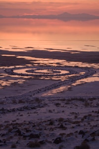 “Spiral Jetty” at sunset, January 4, 2011, 1970, Great Salt Lake, Utah. Collection Dia Art Foundation. Photo ©Greg Lindquist. ©Estate of Robert Smithson/Licensed by VAGA, New York. 