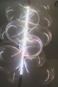 <i>The Luminiferous Aether</i>, 1995 -  2011. Argon gas filled tube, plastic, balloons, light, and air. Dimensions variable (about 87