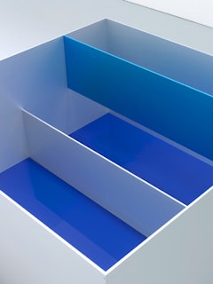 DONALD JUDD, “Untitled˝ (Menziken 89-6) [detail] 1989. Anodized aluminum clear and blue with blue Plexiglas. 39 3/8 × 78 3/4 × 78 3/4 inches. 100 × 200 × 200 cm. Judd Art © Judd Foundation. Licensed by VAGA, New York, NY.  Photos by Tim Nighswander / IMAGING4ART; courtesy of David Zwirner, New York.