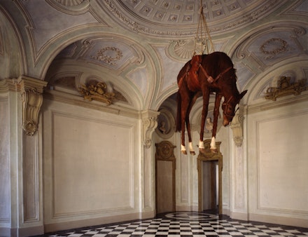 Maurizio Cattelan, “Novecento,” 1997. Taxidermied horse, leather saddle, rope, and pulley, 201.2 x 271.3 x 68.6 cm. © Maurizio Cattelan. Photo: Paolo Pellion di Persano, courtesy of the artist.
