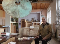 Artist Val Bertoia with Harry Bertoia's Sonambient gong and boxed sound sculptures. Photo credit: Gabriella Radujko, © 2012.